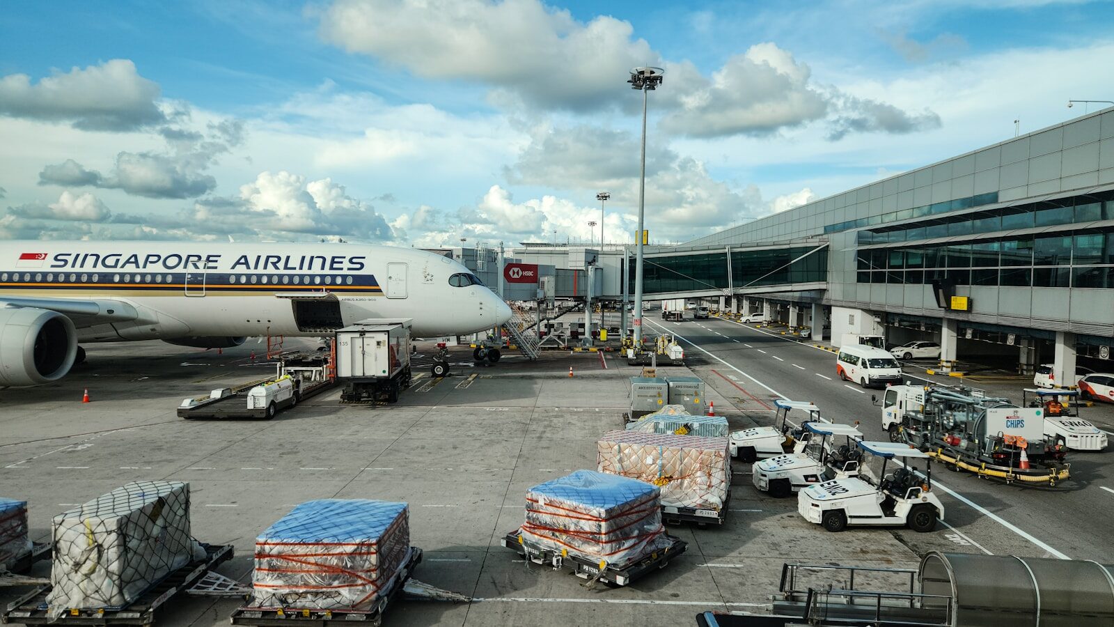 A large jetliner sitting on top of an airport tarmac