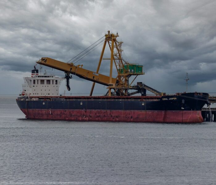 a large ship with cranes on it