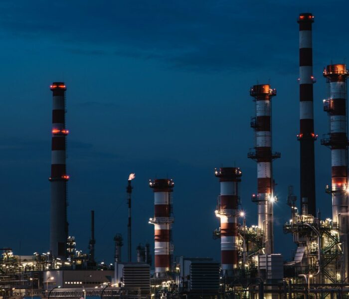 red and white tower under blue sky during night time