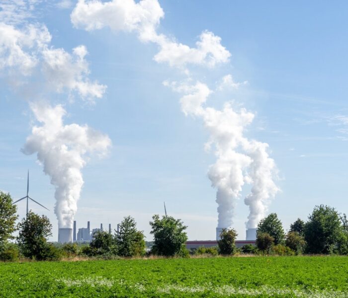 a field with smoke coming out of it